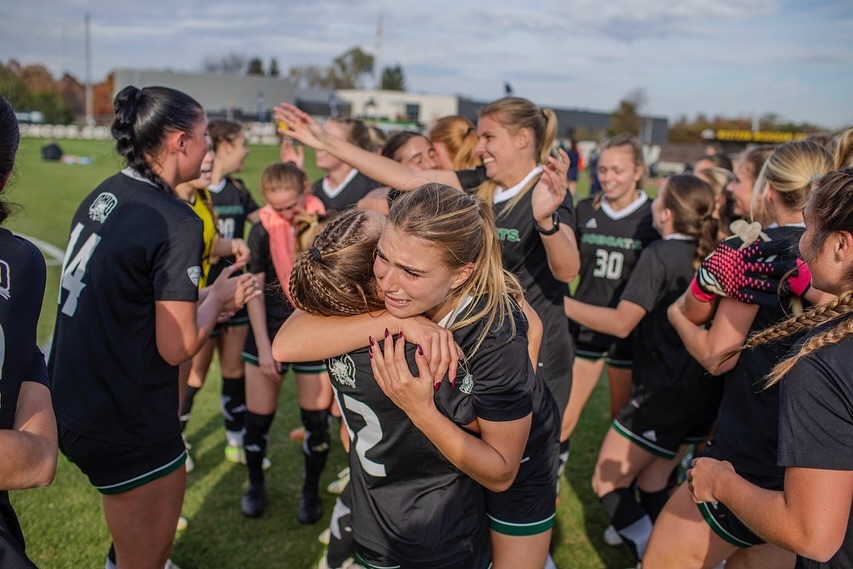 members of the OHIO women's soccer team celebrate a win