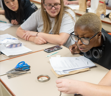 First-year science students analyze materials in the lab from their mock crime scene