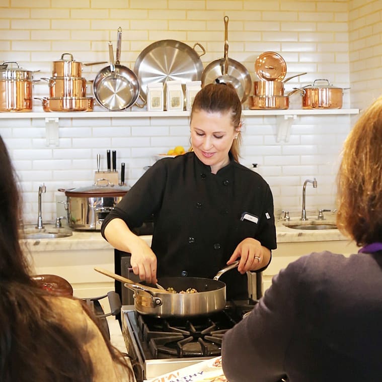 chef christina xenos gives a cooking demonstration