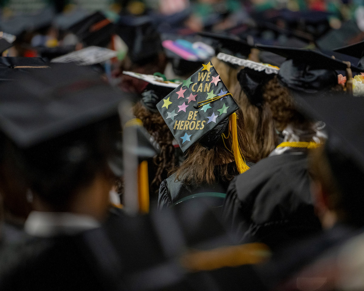 A decorated mortarboard at the Fall 2024 commencement ceremony