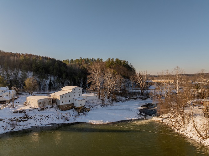 White's Mill and the Hocking River are shown on a snowy day in January