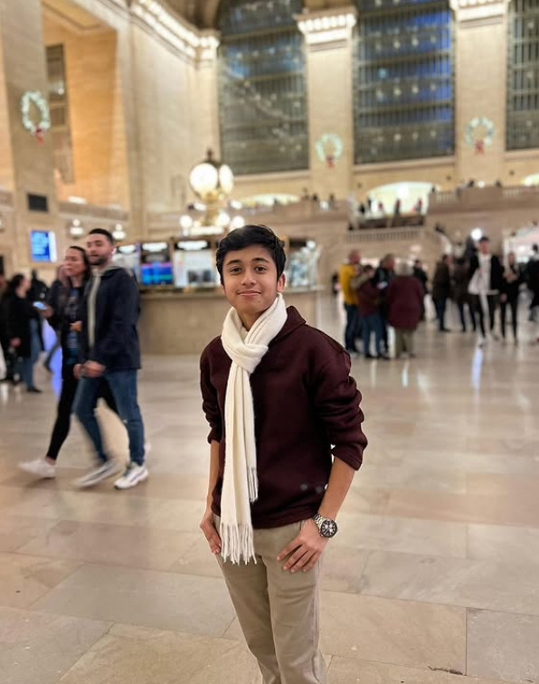 A man standing in Grand Central Terminal in New York City.