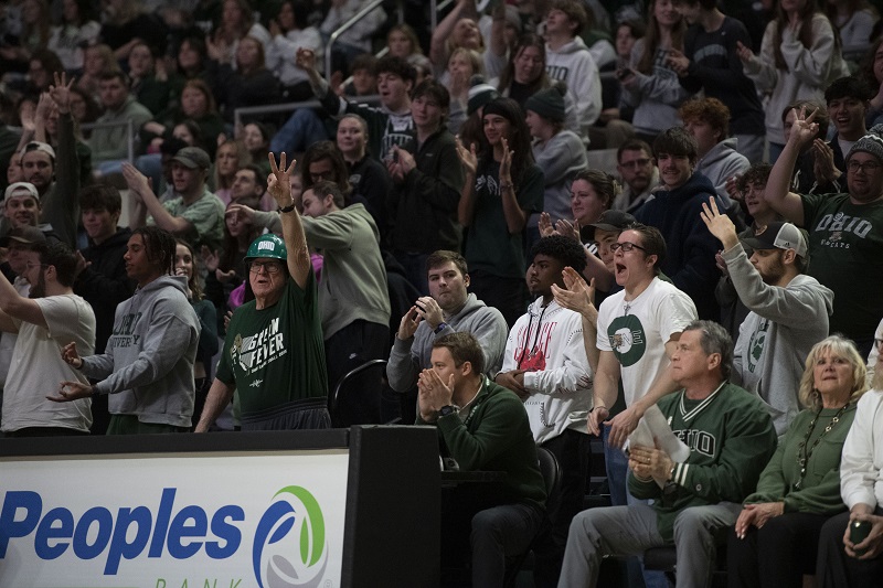 Bobcat fans cheer on the OHIO Men's Basketball Team in the Convocation Center on Sibs Weekend.