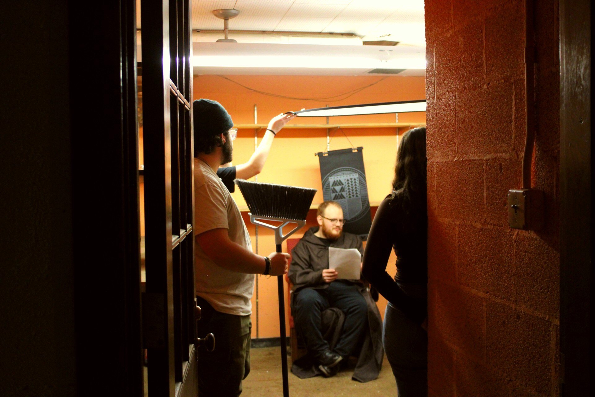 Students filming in small room