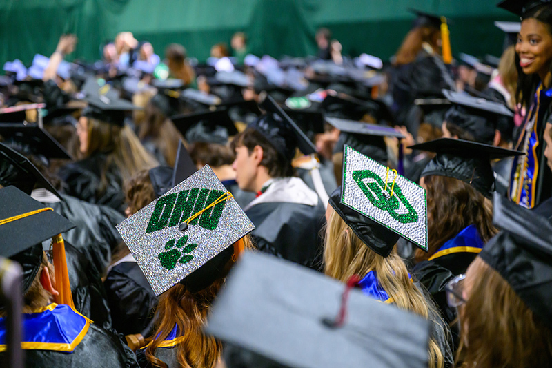 Graduating students at the 2025 Ohio University Spring Commencement Ceremony show off their mortarboards