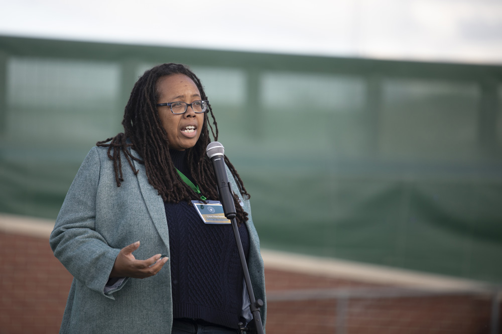 Dr. Lisa Harrison giving a speech at the Taste of Brewing event.