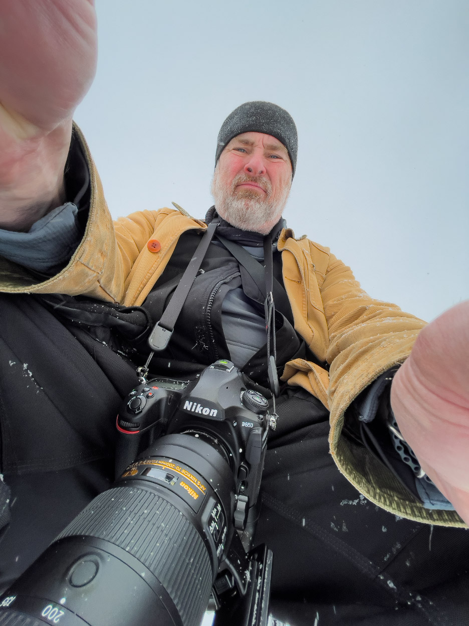 David McChesney holding a camera