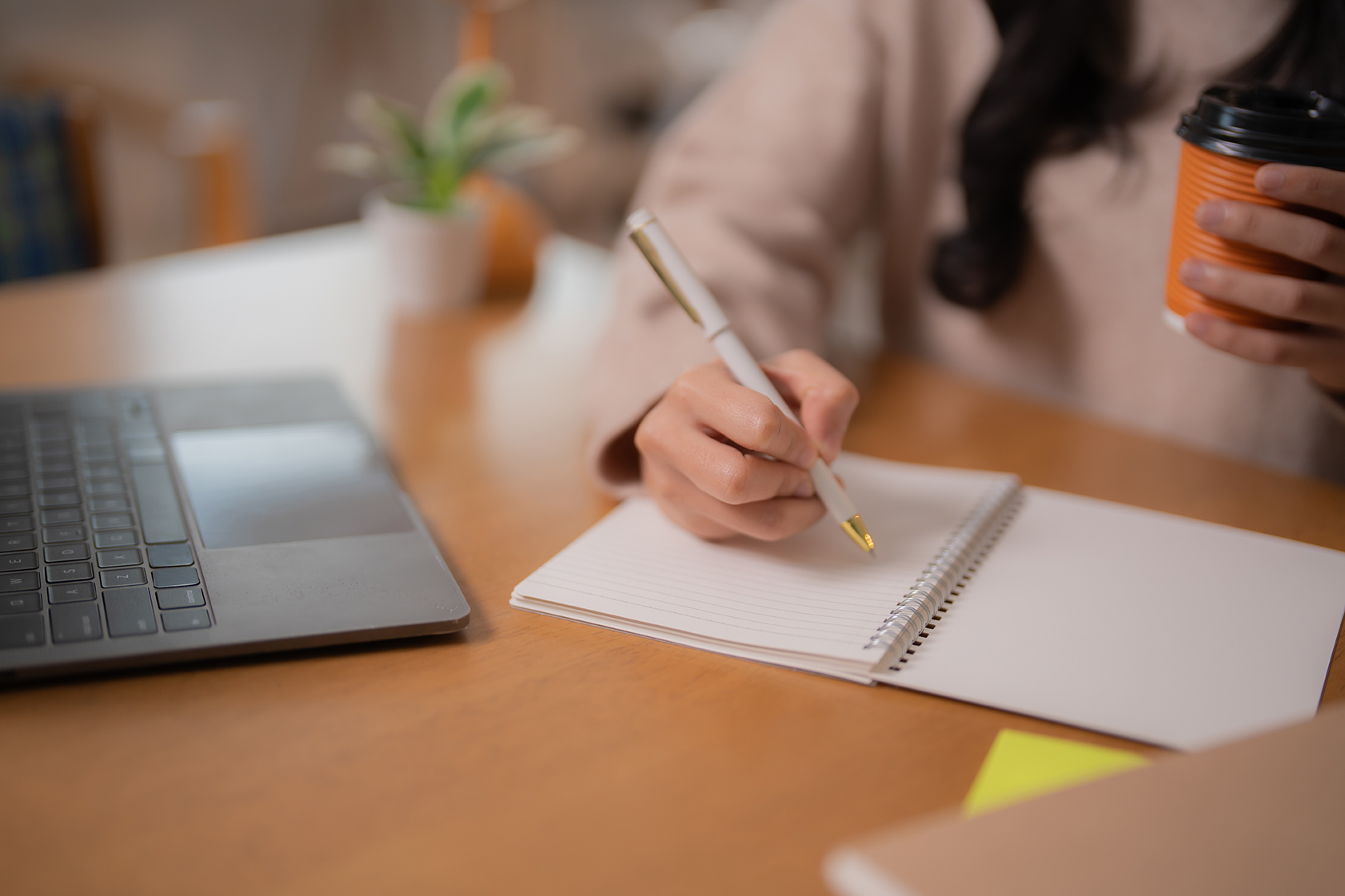 Adobe Stock photo of a woman taking an online course