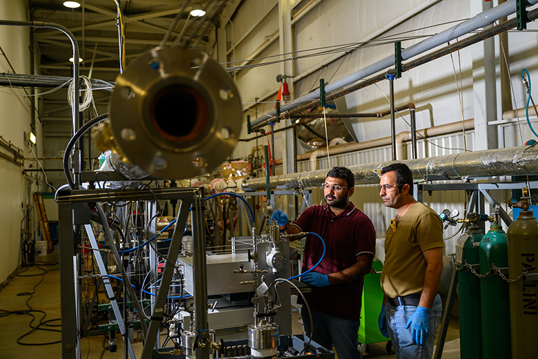 Students work on a pilot-scale multiphase flow loop.