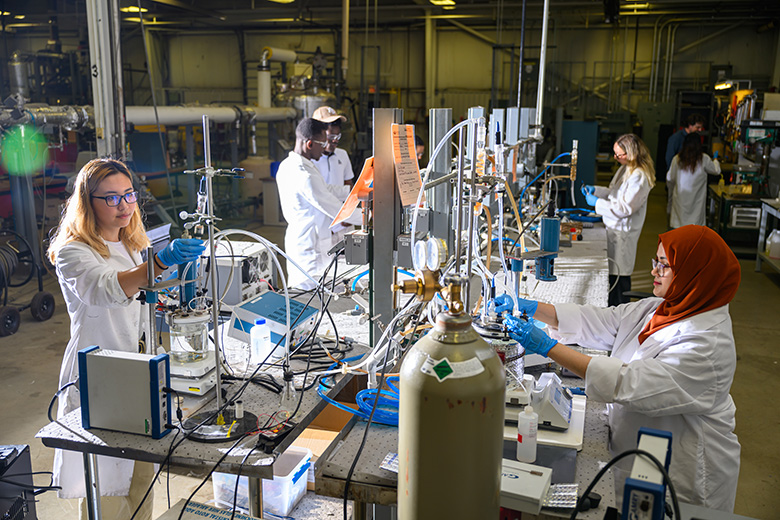 Students work on bench-scale equipment at the ICMT.