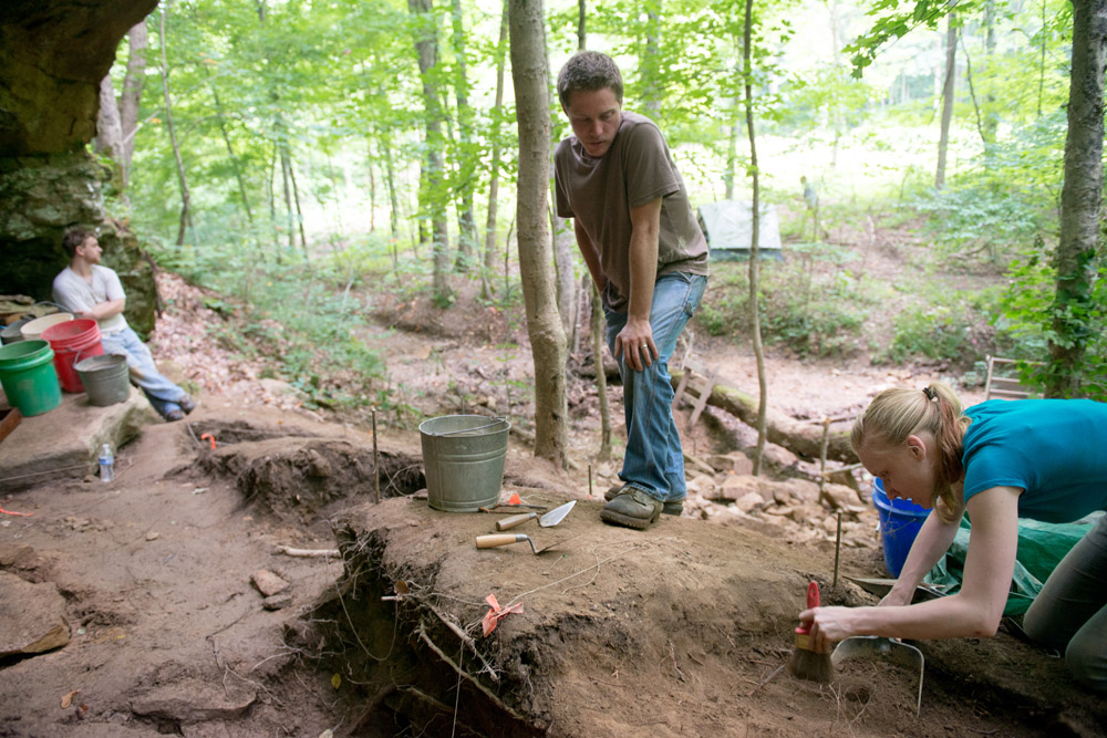 Students excavating in a cave.