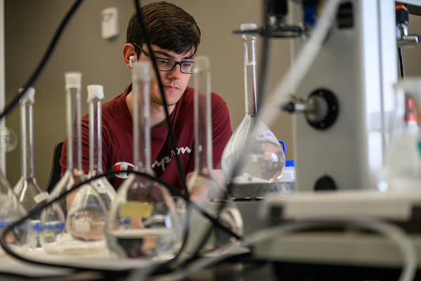 A student conducts research at OHIO. 