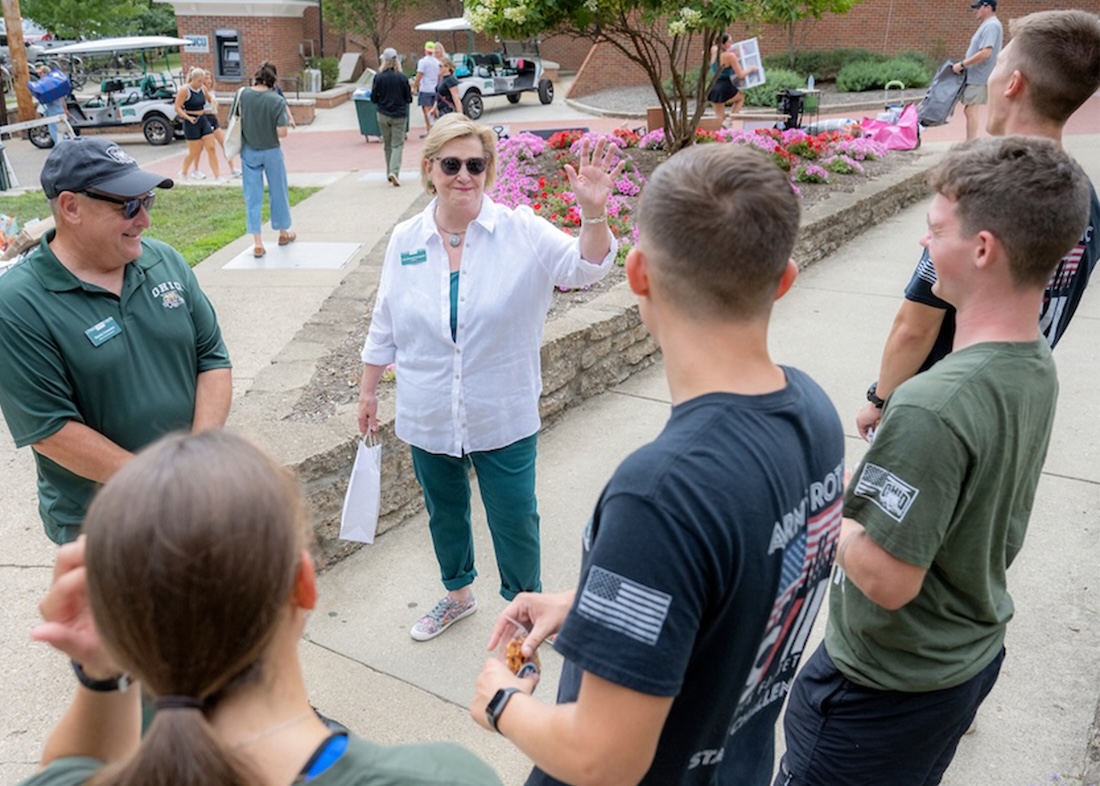 President Gonzalez smiles as she speaks to a group during move-in