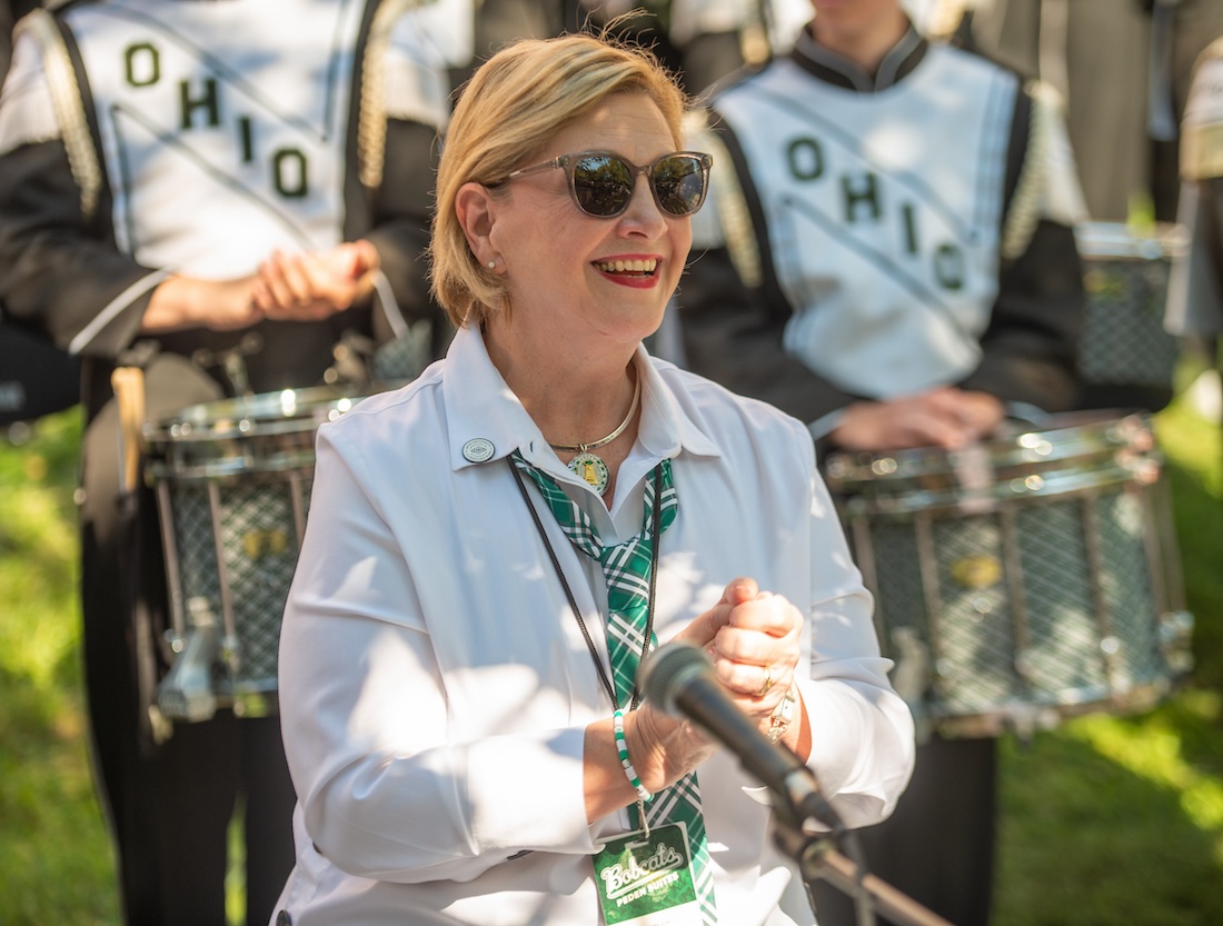 President Lori Stewart Gonzalez speaks to the audience at the 2025 Yell Like Hell rally for Homecoming