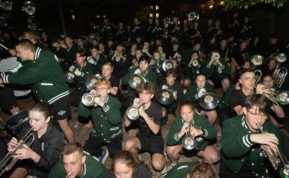 The Marching 110 play at night, 