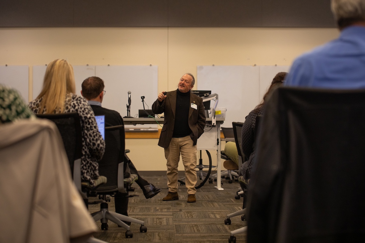 Professor talking to. students