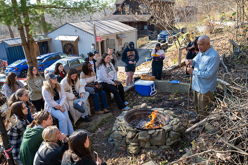 David Butcher hosting a group of Ohio University students outside the museum