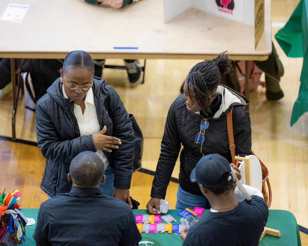 Students look at a table at the spring involvement fair
