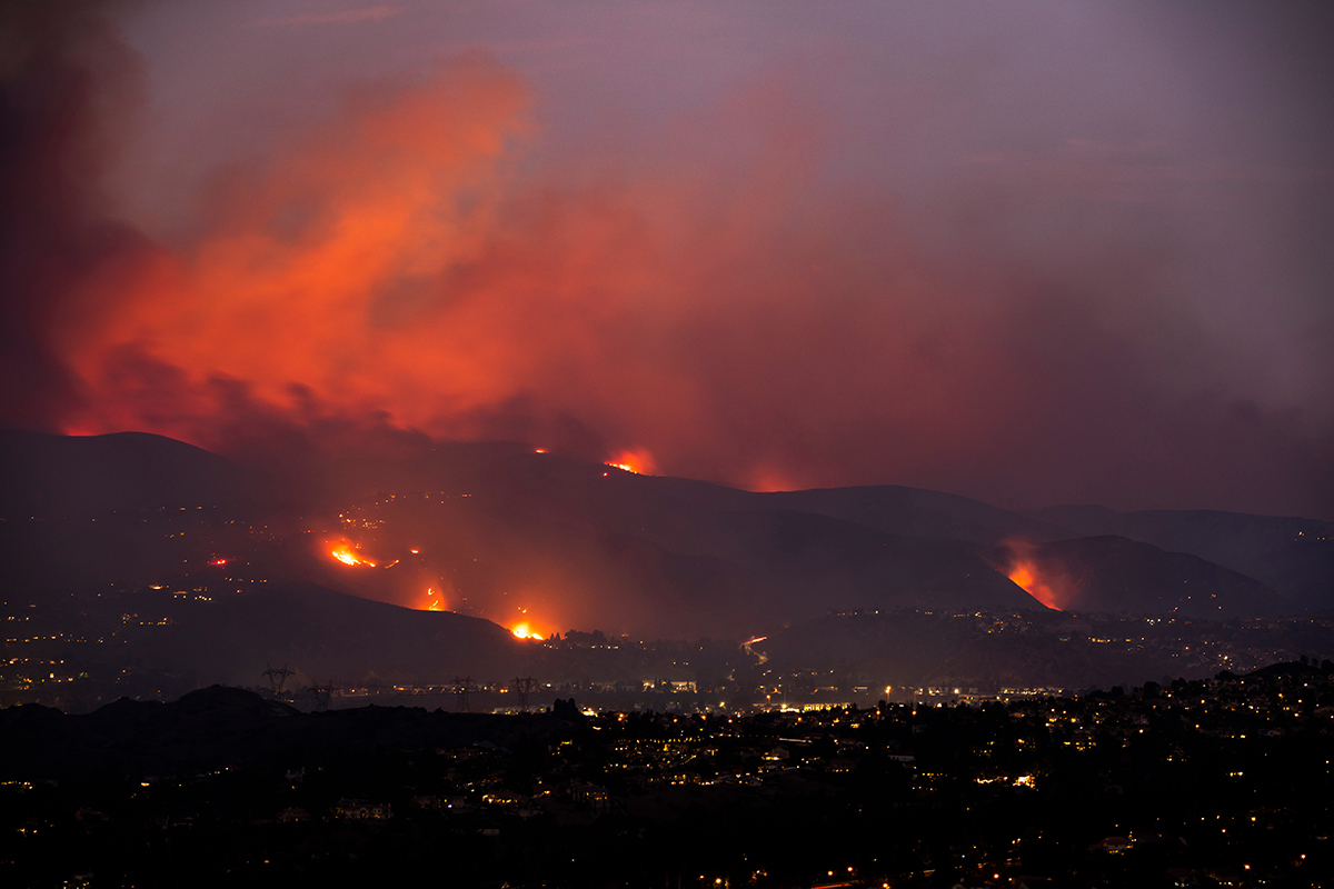 Fires burn on the dry hills surround the Los Angeles area.