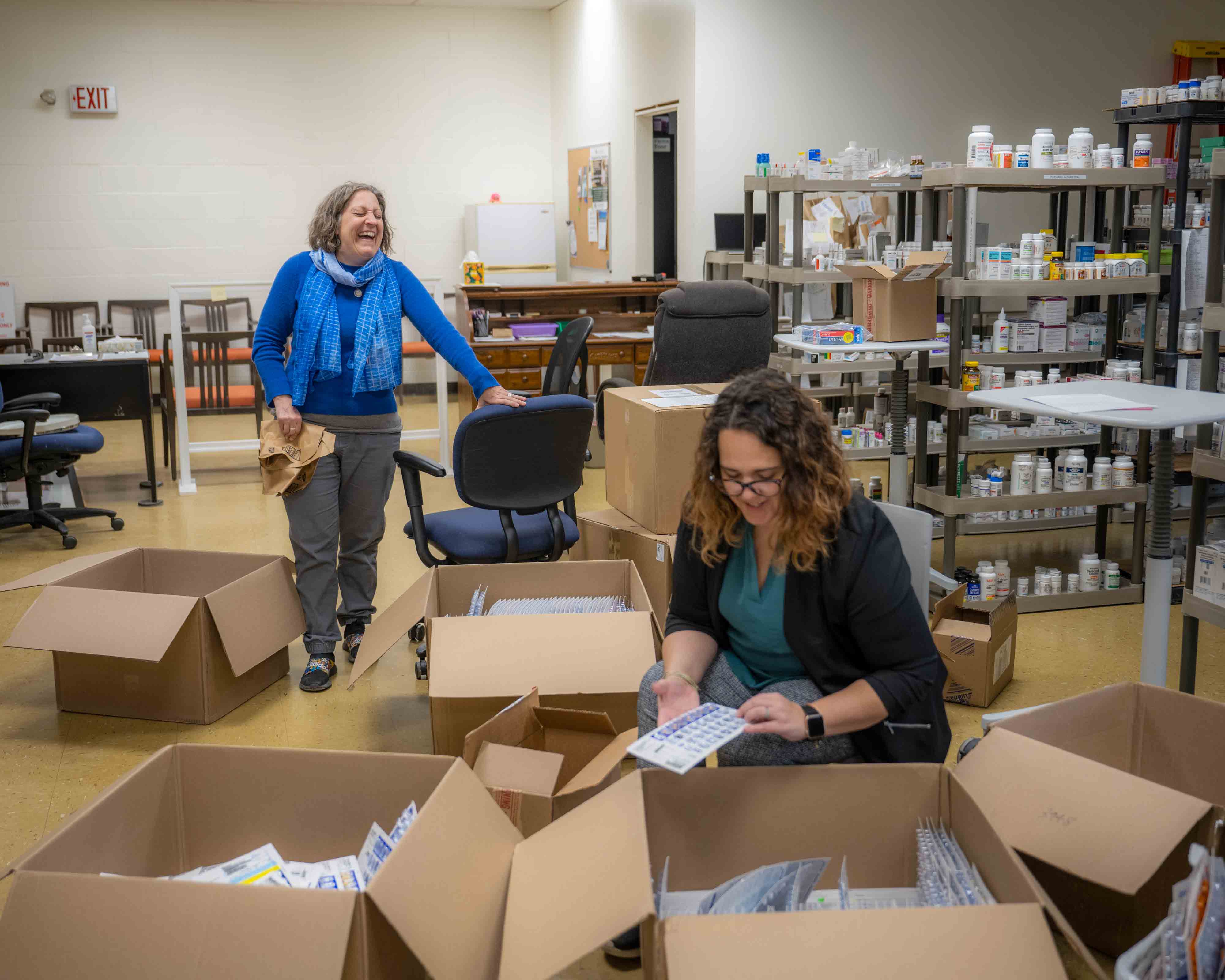 Sarah Adkins talks with Pharmacist Hayley Sowers-Hunter 