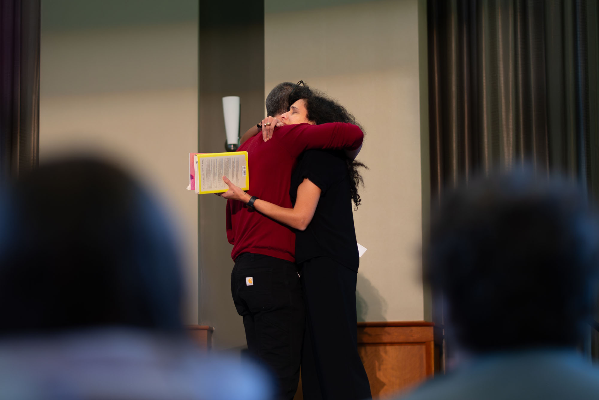 Hala Aylan hugging an attendee at the Spring Literary Festival