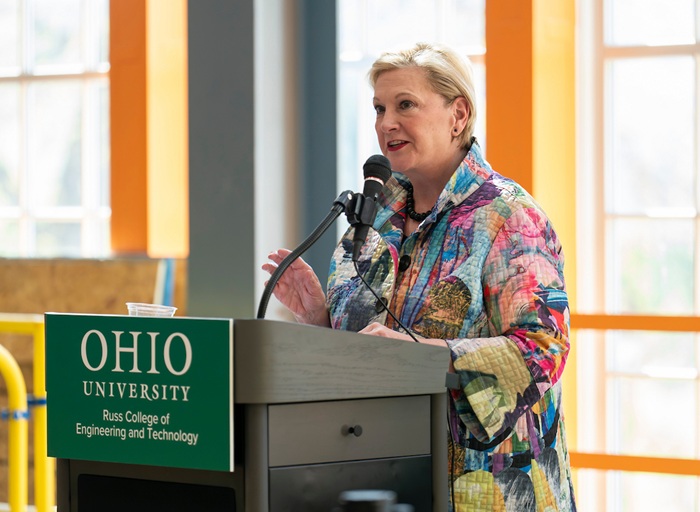Ohio University President Lori Stewart Gonzalez speaks at the podlum during the ribbon cutting ceremony