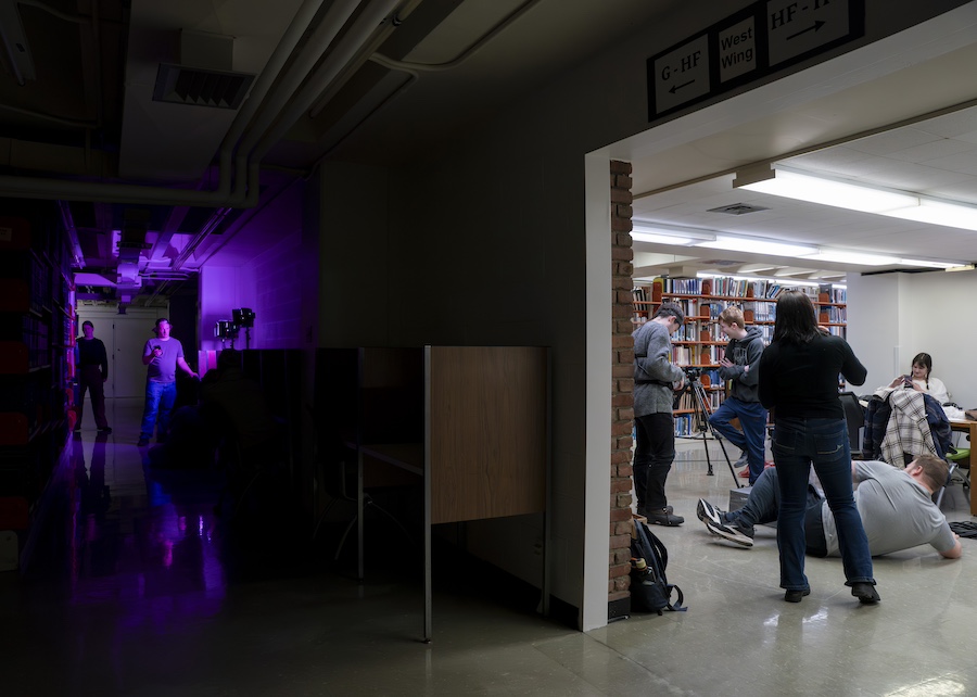 People using cameras to make a short film