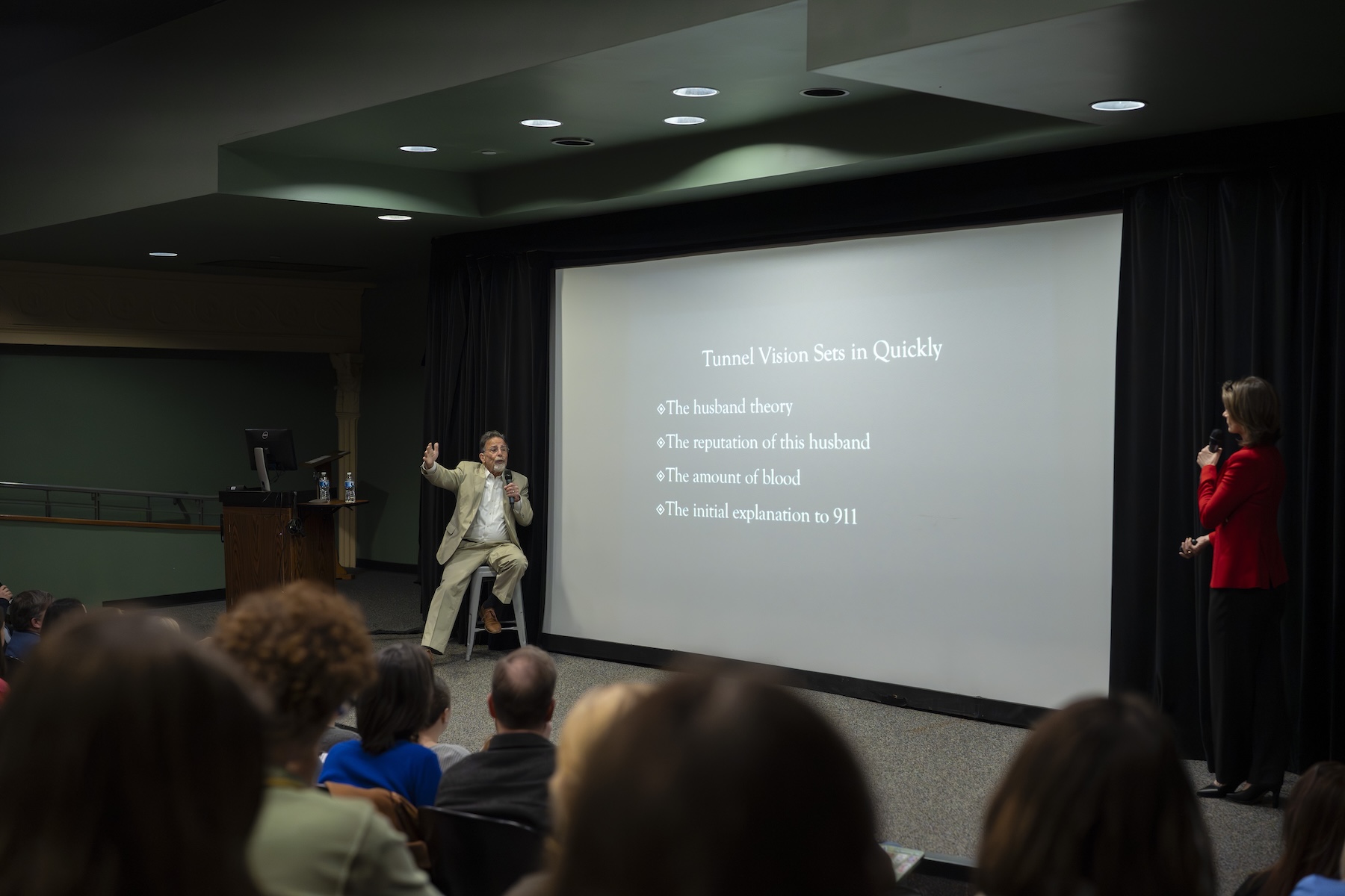 Ohio Alum Sonya Pfeiffer and Husband David Ruldolph in the Athena Cinema giving a presentation on cognitive biases for Pre-Law day 