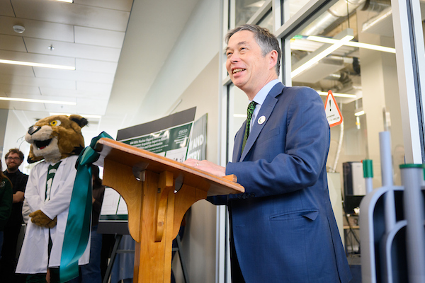 Dean Ando speaks during the event.