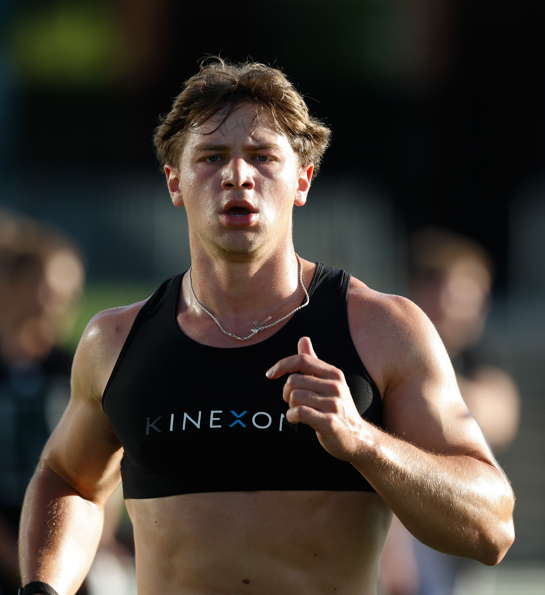 Linebacker Jack Fries runs on the field during OHIO football practice.