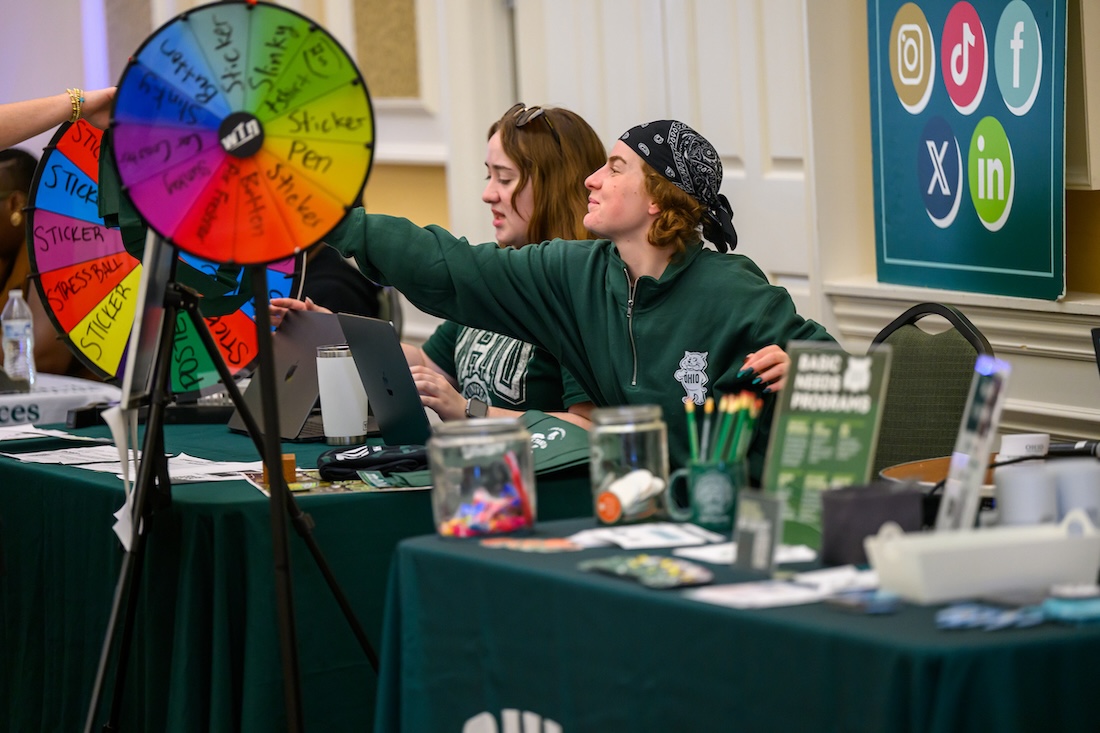 OHIO staff members greet people at a resource fair
