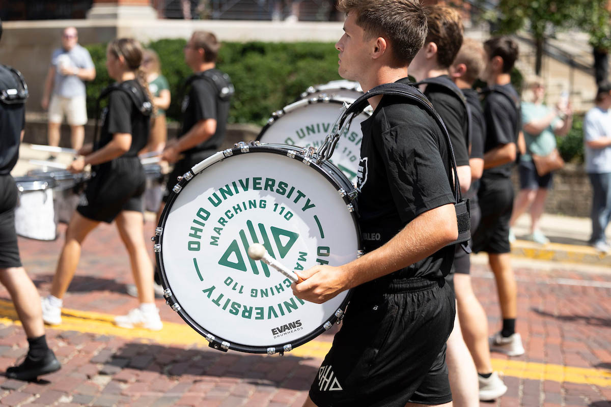 A member of the Marching 110 participates in the parade up Richland Avenue