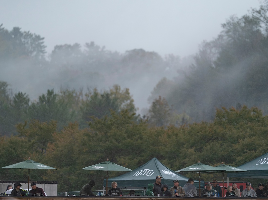 OHIO tents under the misty sky, nestled in the fall hills of Athens