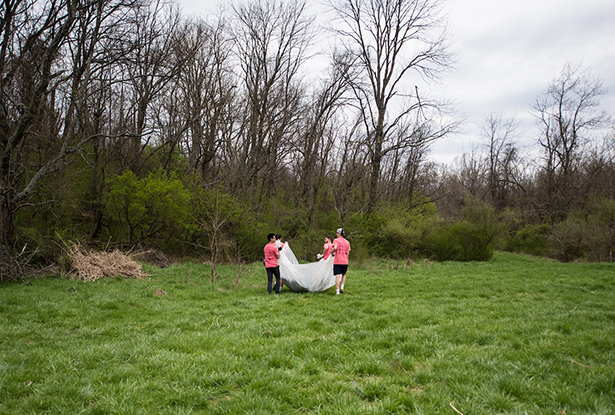 Volunteers move clean fill dirt on property behind the Dairy Barn Arts Center.