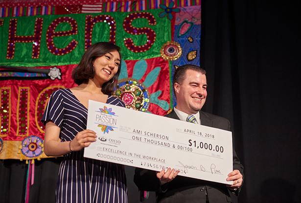 Pete Trentacoste, director of Housing and Residence Life, presents a Division of Student Affairs Student Employee Scholarship for Academic Excellence to Ami Scherson, a junior majoring in music through OHIO’s Honors Tutorial College.