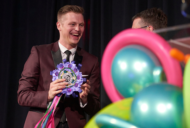 Joseph Brenckle is all smiles upon receiving this year’s Outstanding Graduate Student Leader Award in the master’s student category.