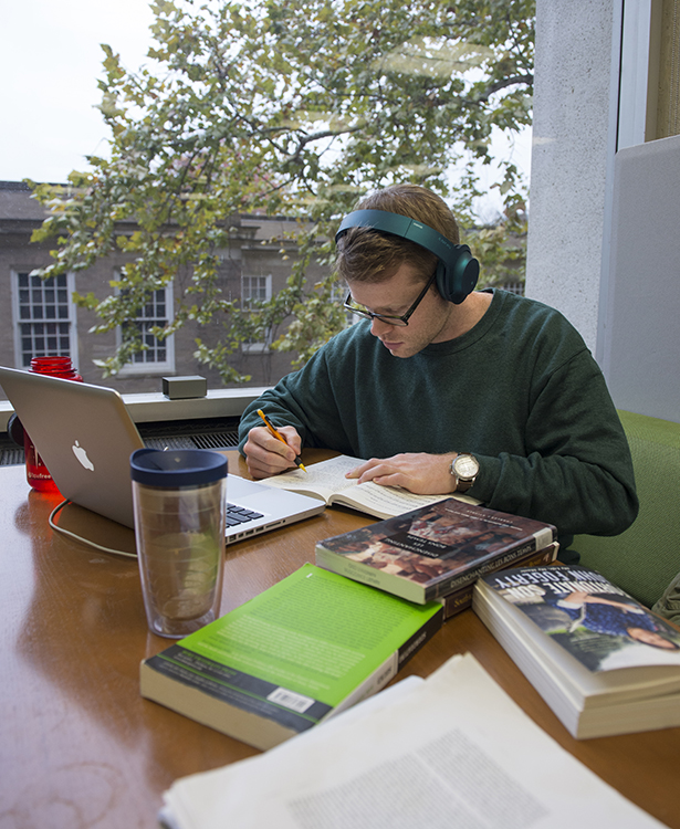 Josh-Wade Ferguson, an Athens resident and doctoral candidate at the University of Mississippi, researches American blues literature in the renovated study areas on the fourth floor of Alden Library.