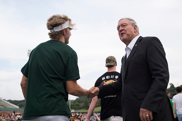 Nellis greets students