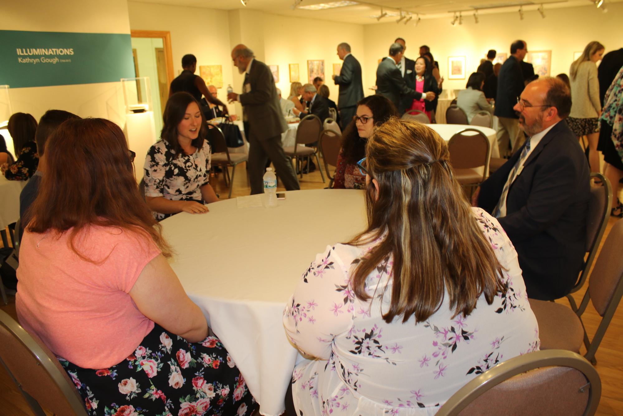 OHIO Board of Trustees socialize with Chillicothe campus students during lunch on June 21