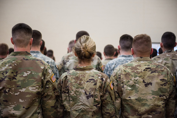 ROTC cadets stand for national anthem