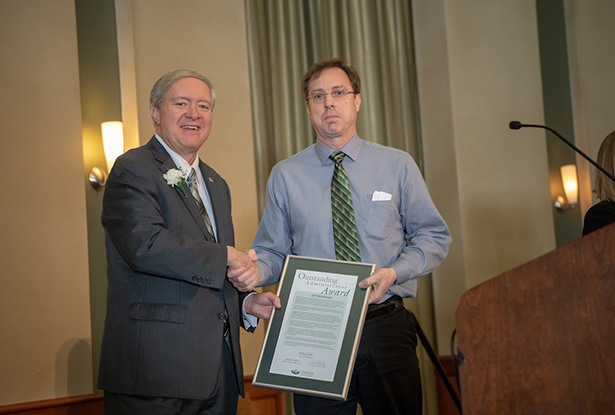 Ohio University President M. Duane Nellis presents a 2018 Outstanding Administrator Award to Jeff Whitehead, athletic director at Ohio University Lancaster.