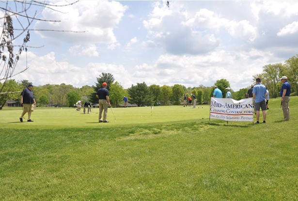 Golfers participate in a putting contest before the tournament, named in honor of long-time Southern Campus supporter Bernard L. Edwards.