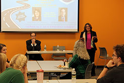 ric Burchard, director of government relations at OHIO, and former Ohio legislator Debbie Phillips speak to a group of OHIO students, faculty and staff.