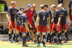 Dr. Harvey talks to Team USA during a timeout in an afternoon game.