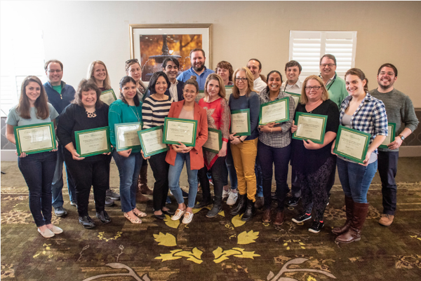 The fellows gather for a group portrait with their certificates of completion, noting the end of their week-long stay in Athens for the Kiplinger Program in Public Affairs Journalism. Photo by Hannah Ruhoff