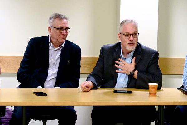 Dr. Scott Titsworth, dean of OHIO’s Scripps College of Communication, and Dr. Robert Stewart, director of the E.W. Scripps School of Journalism speak to the fellows.