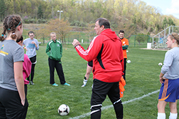 David Carr coaching female soccer players