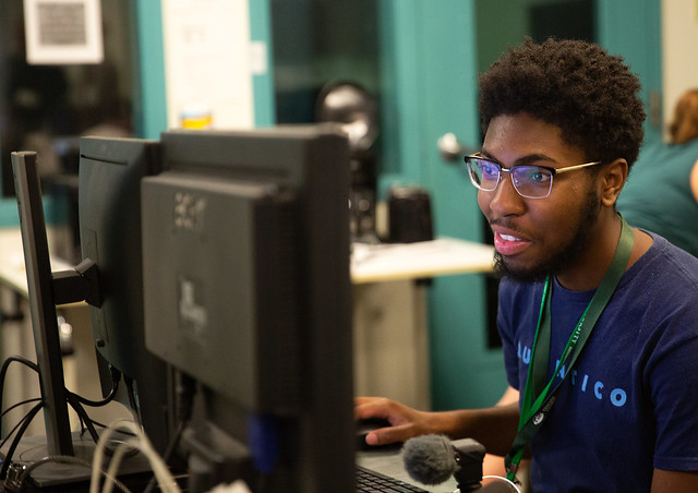 A student works on their track project during the high school journalism workshop. They attended five track sessions to delve into their area of interest. Photo courtesy of the E.W. Scripps School of Journalism