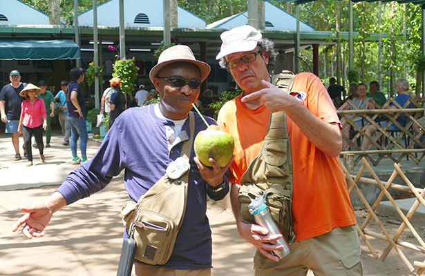 Obi enjoys a fresh coconut drink at Cu Chi Tunnels in Vietnam