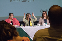 Robin Muhammad explains her strategies in response to a question during the opening panel discussion of the 2018 conference.